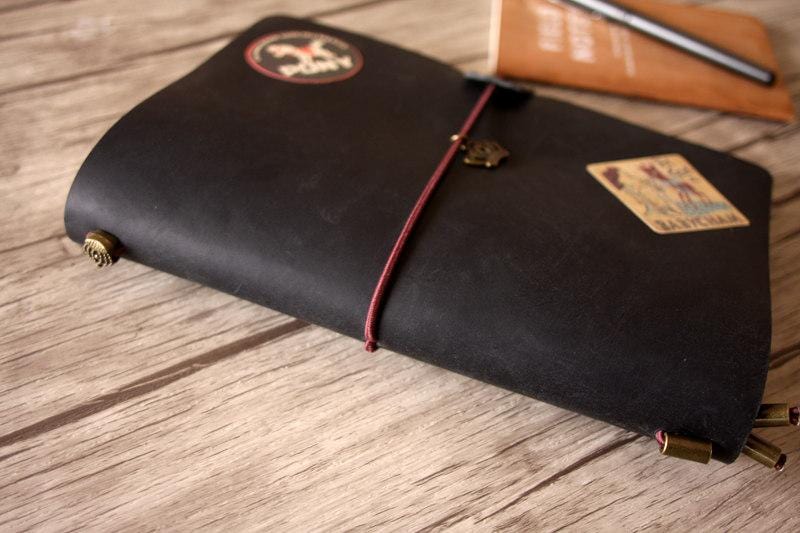 Bìa sổ tay du lịch Moleskine bằng da dập nổi