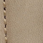 Vòng tay bằng cuir véritable rembourré Whitby và màu be pastel pour une élégance raffinée