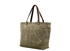 Túi tote đeo vai bằng vải canvas màu đen có nhiều ngăn.